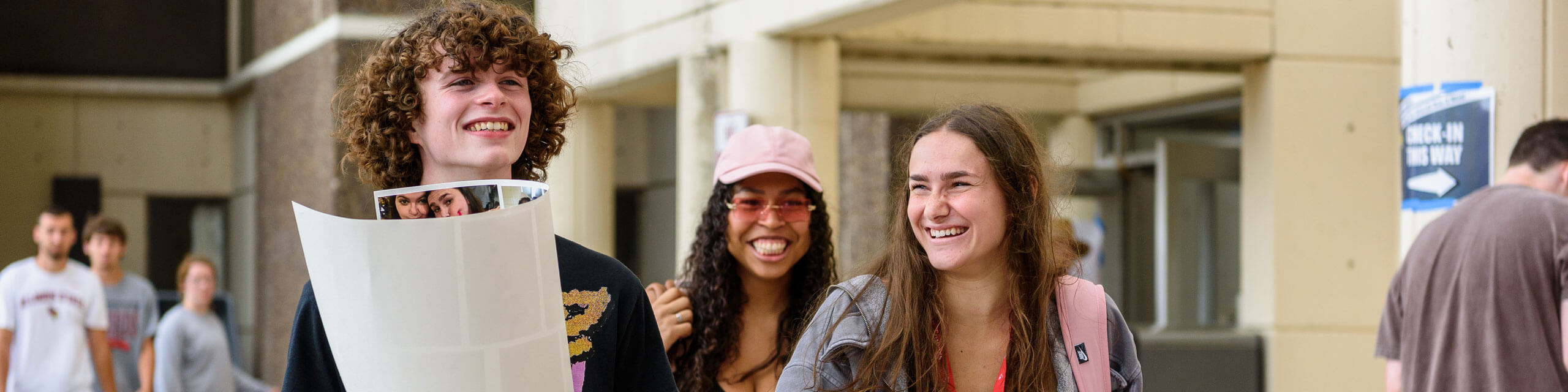 Students smile as they move-in.