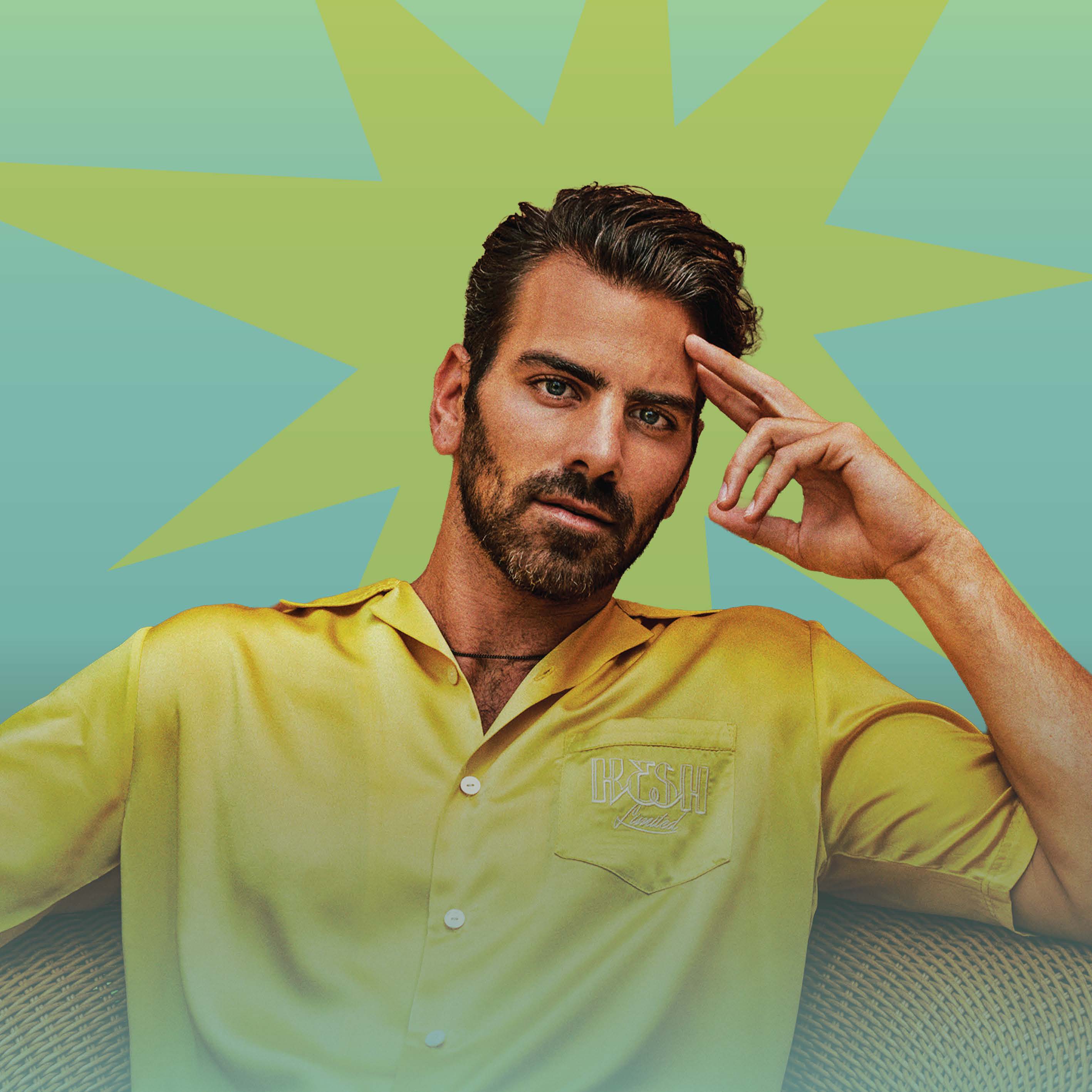 nyle dimarco in a yellow shirt with blue and green backdrop