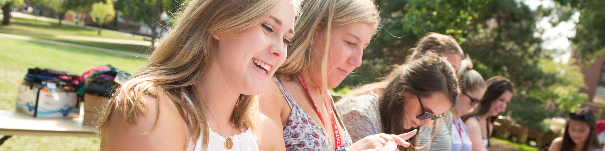 Student smiles while participating in Festival ISU activities.